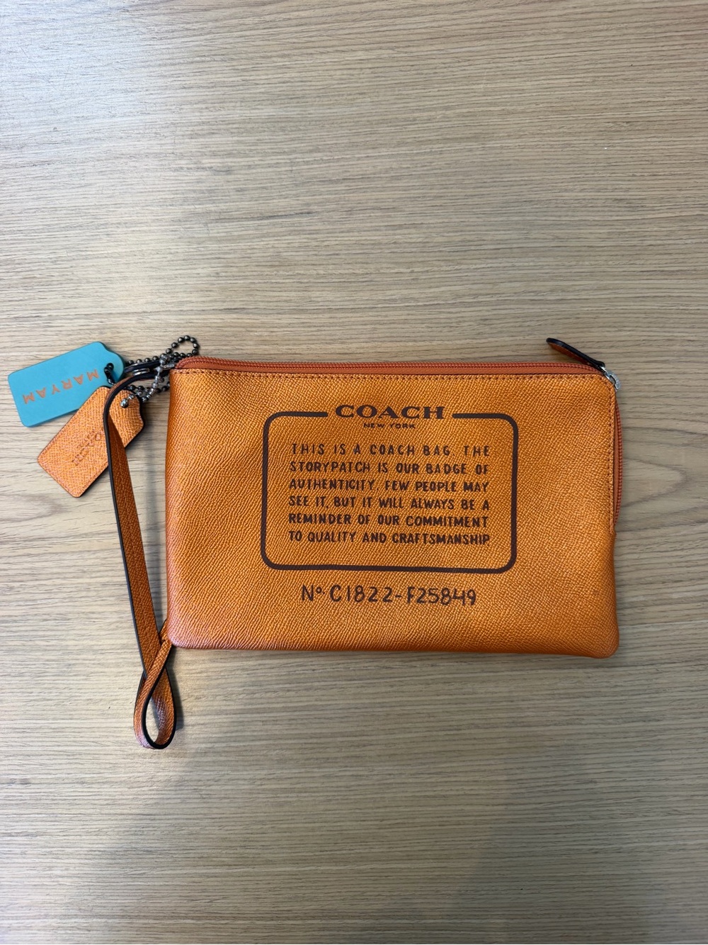 COACH Orange Leather Wristlet Pouch
